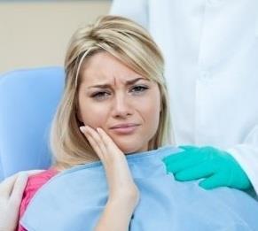 Причины зубной боли во время беременности